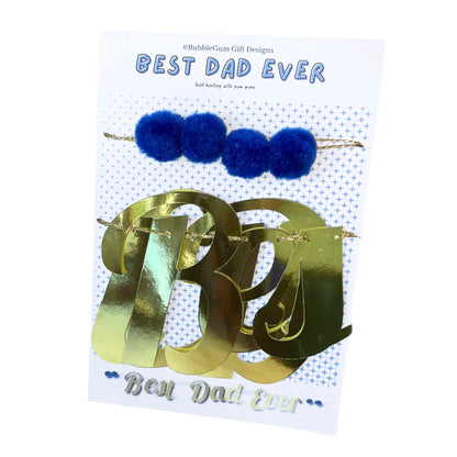 Shiny gold Best Dad Ever sign Wall hanging decoration for Father's Day bunting for dad with cute blue pom poms