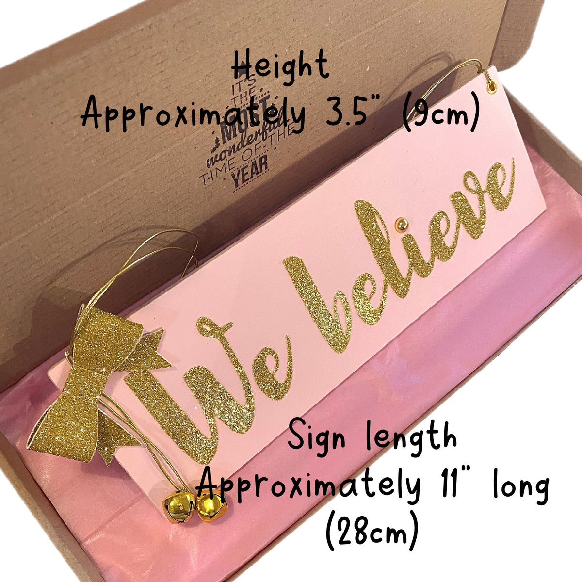 We Believe Wooden MDF Hanging Christmas Sign Pink Gold 11x3.5"