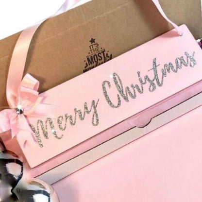 Merry Christmas sign availble in three colours, Christmas red, baby pink, or icy blue with satin bow and bells