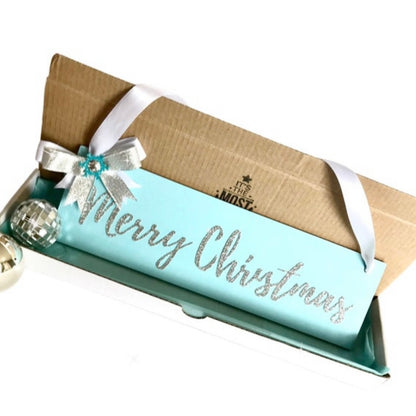 Merry Christmas sign availble in three colours, Christmas red, baby pink, or icy blue with satin bow and bells